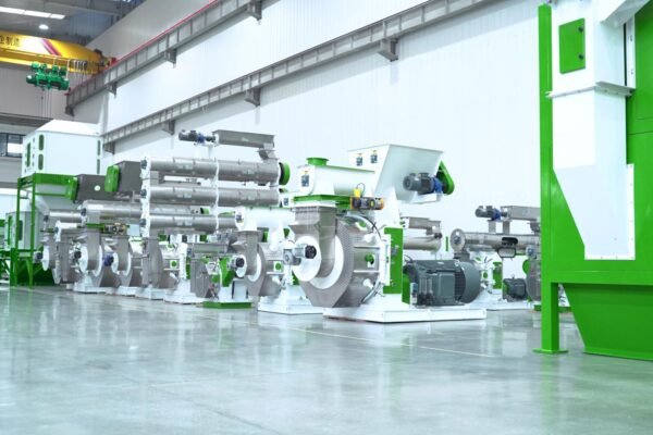 Pellet machines in a manufacturing workshop awaiting project-specific compliance review